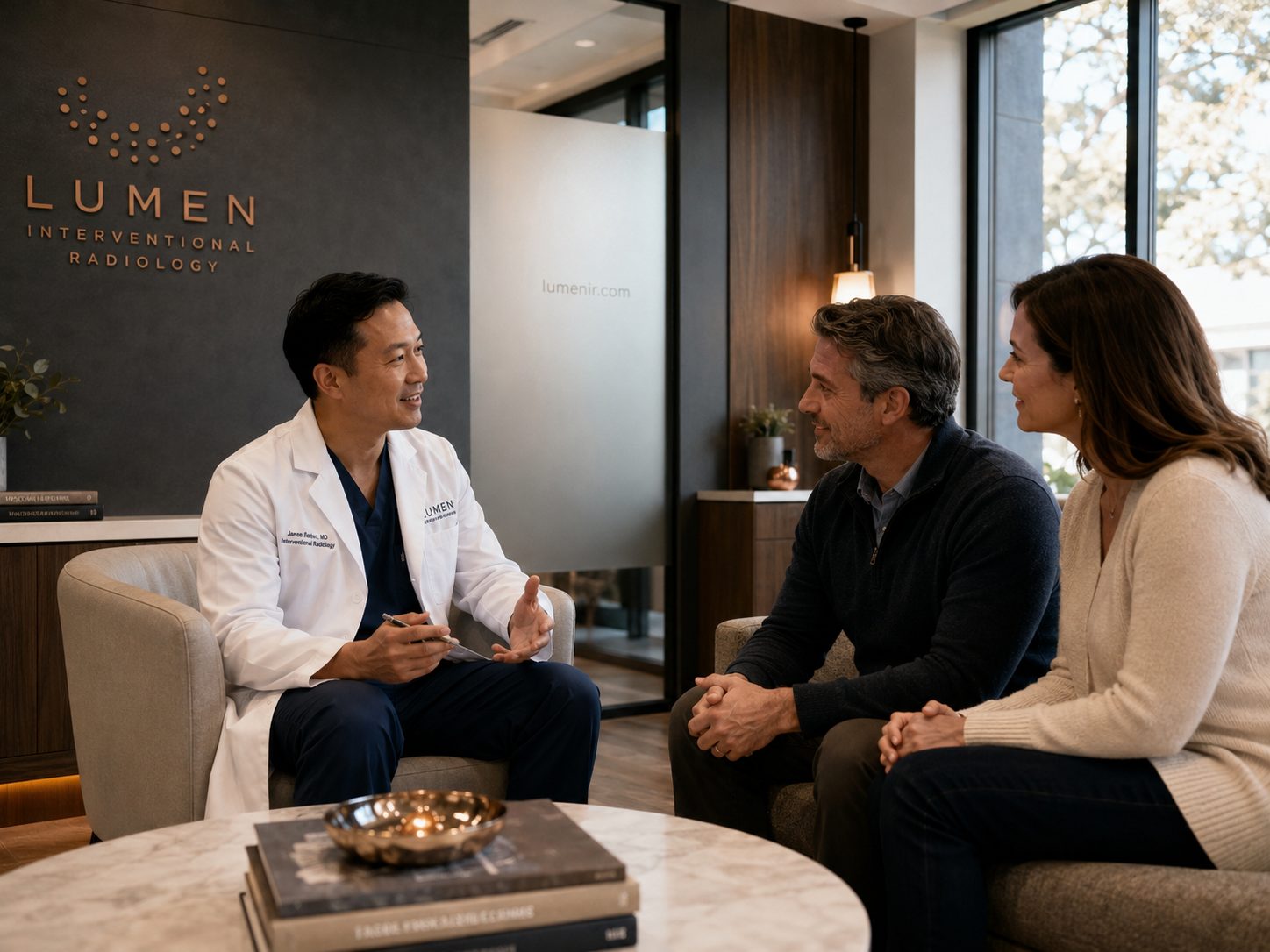 Dr. James Kim consulting with patients in the Lumen lounge